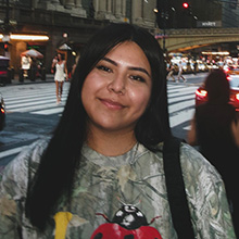 Jasmyne Haskie headshot with city street background